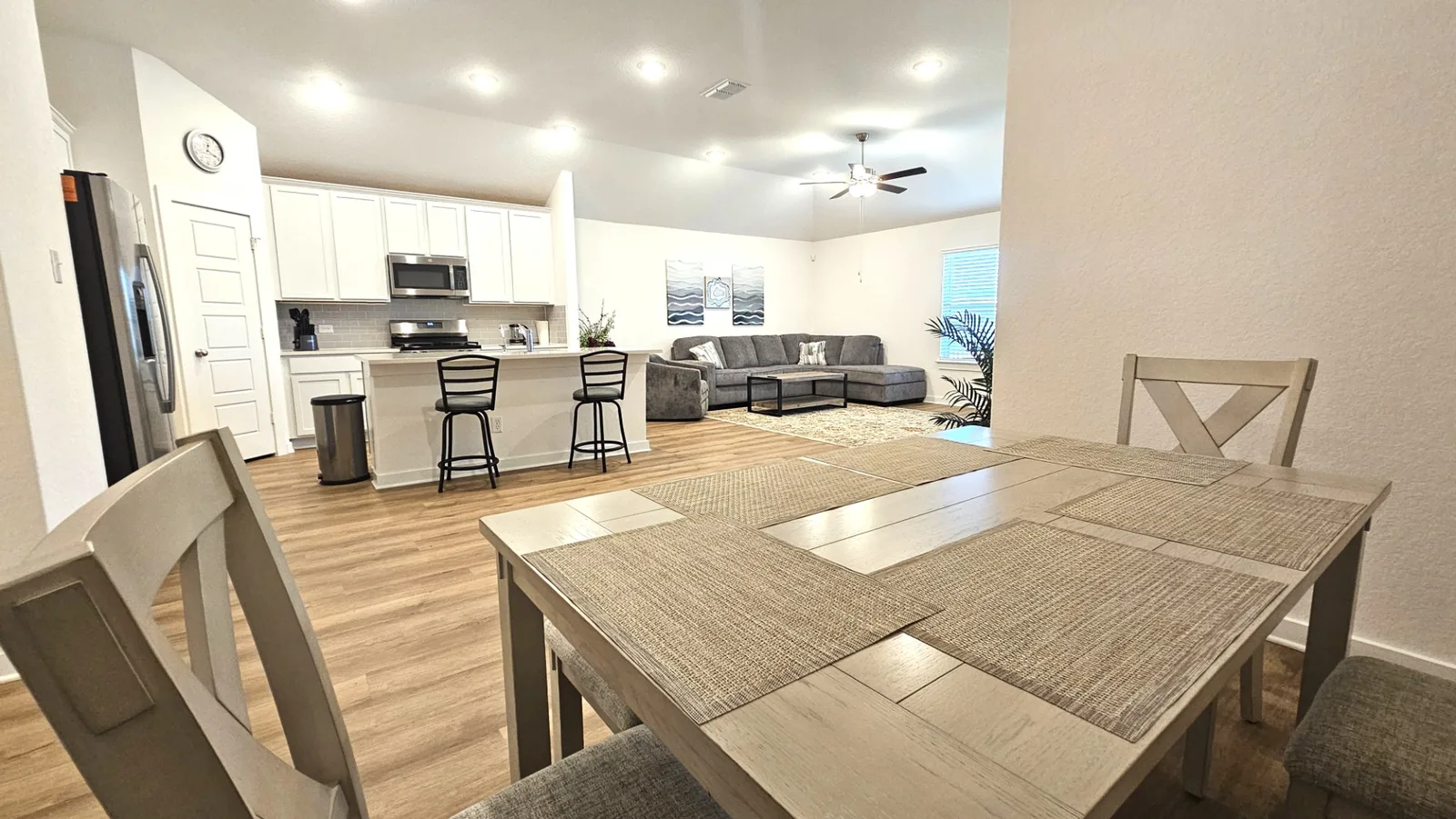 Furnished dining area beside the open kitchen at Beebrush Saddle