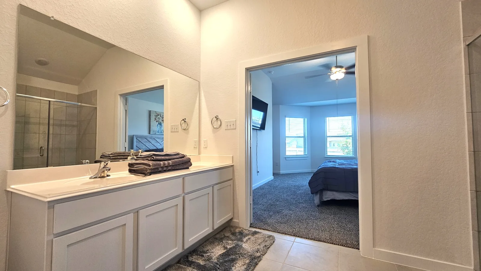 Primary bathroom vanity at the Beebrush Saddle furnished home