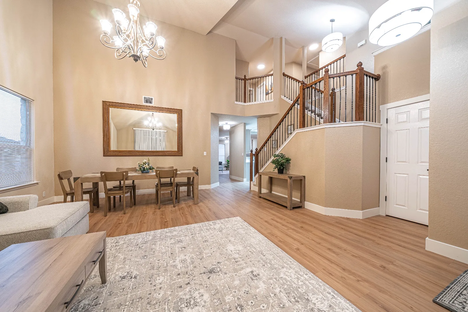 Dining area, entry, and staircase at Bright Chase