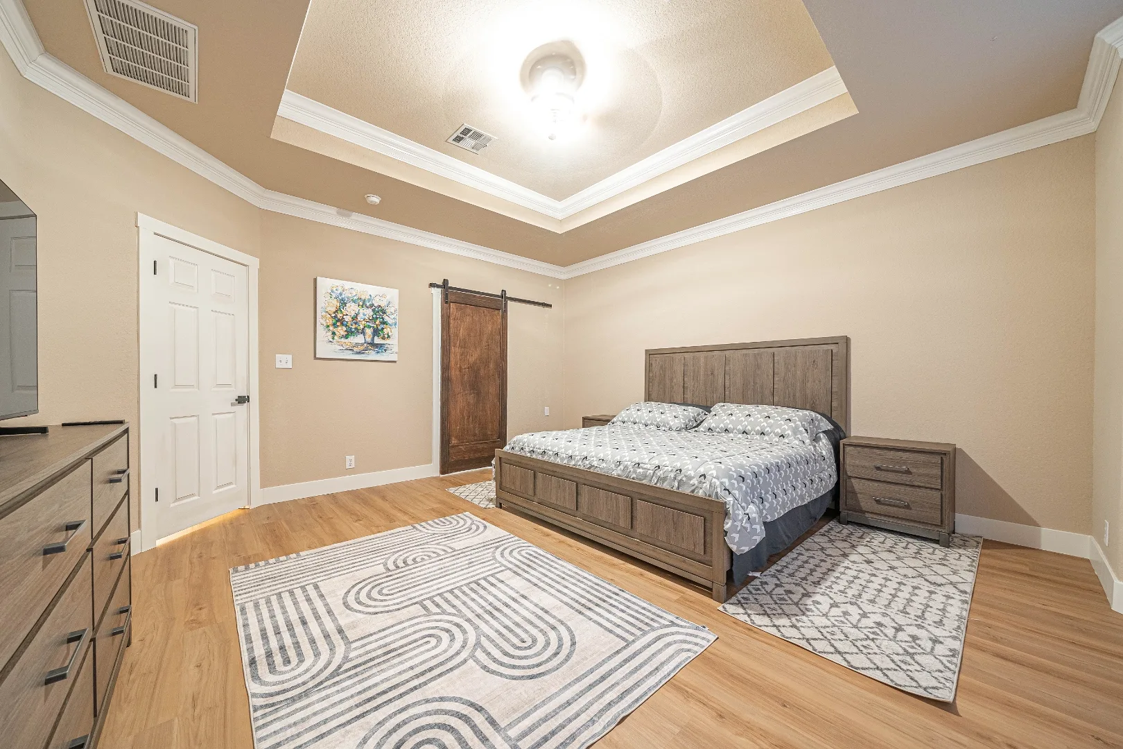 Second view of the furnished primary bedroom at Bright Chase