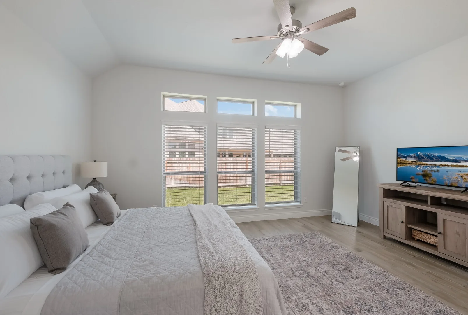 Furnished primary bedroom at Desperado Run