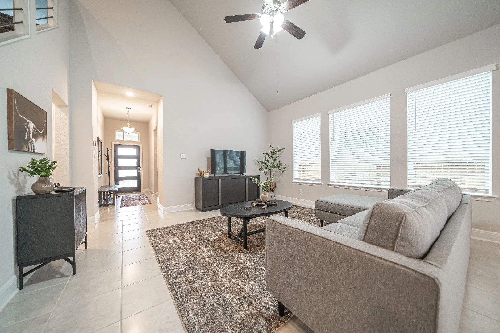 Furnished open living room and entry at Locklear Way