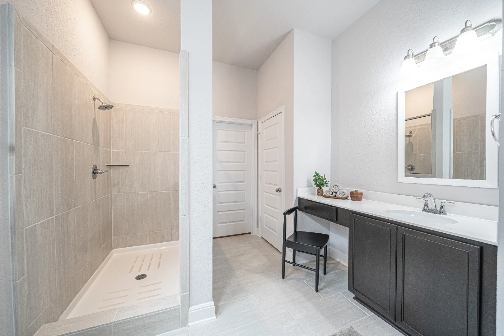 Primary bathroom with dual vanities at Locklear Way