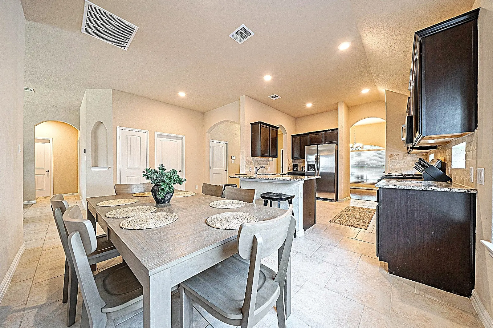 Furnished dining area and kitchen at Rawhide Way
