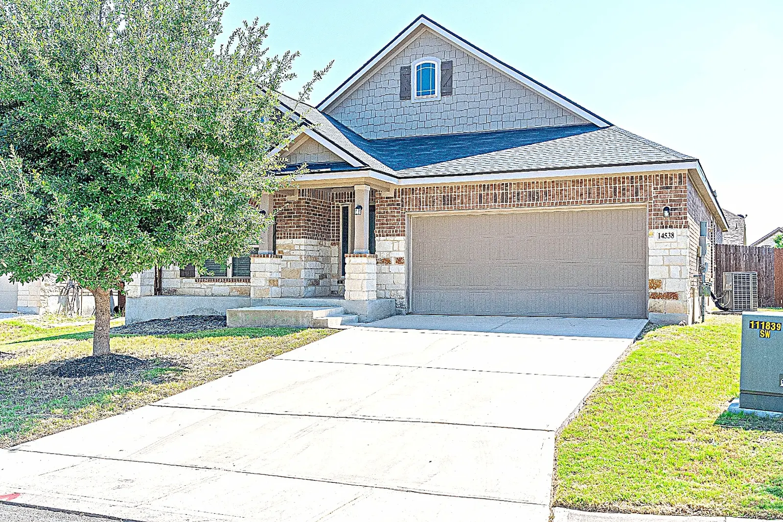 Brick exterior of the Rawhide Way furnished home