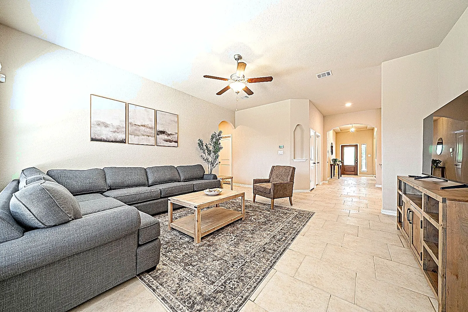 Bright furnished living room at the Rawhide Way home