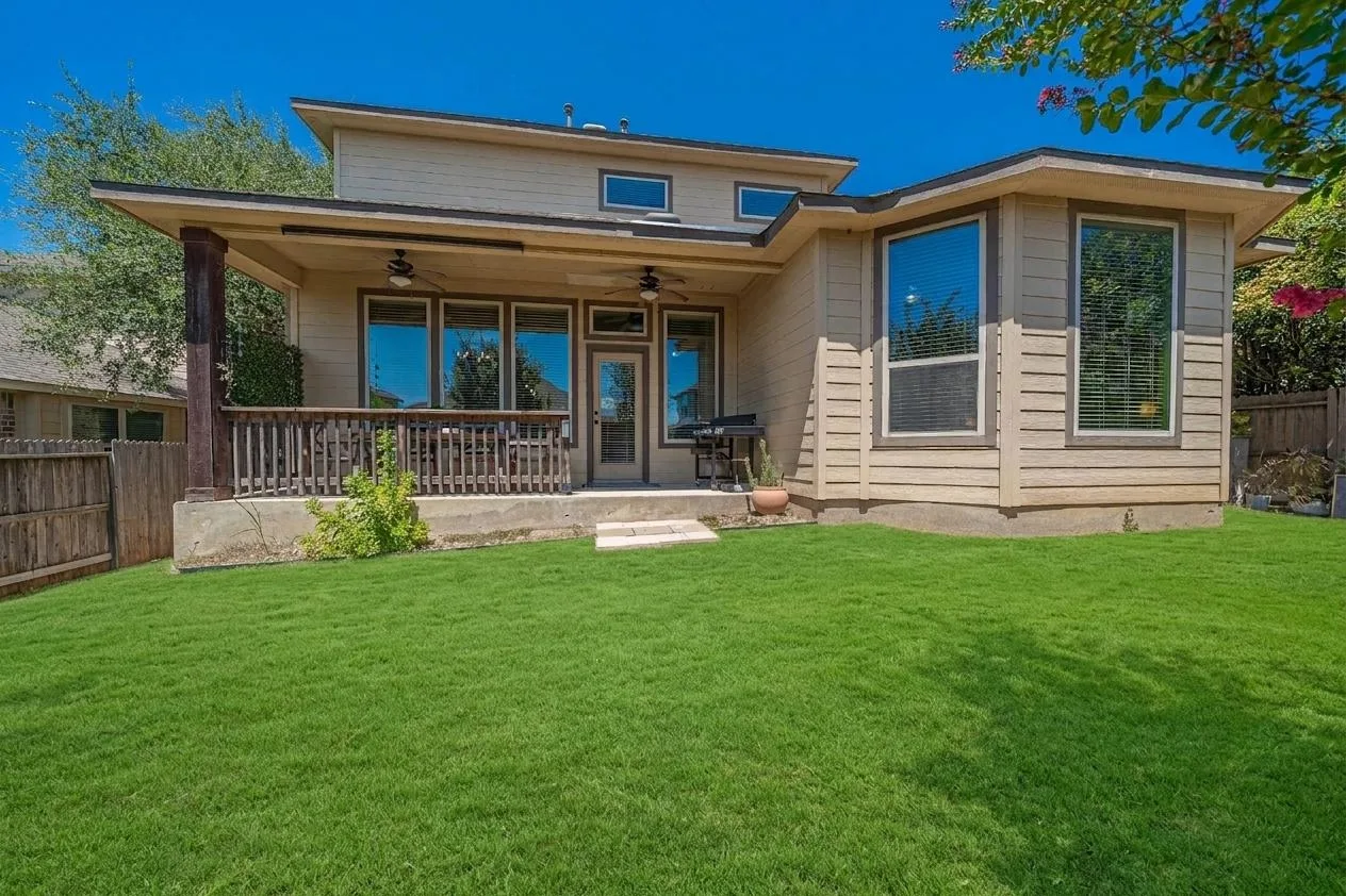 Private backyard and covered patio at the Upton Park home