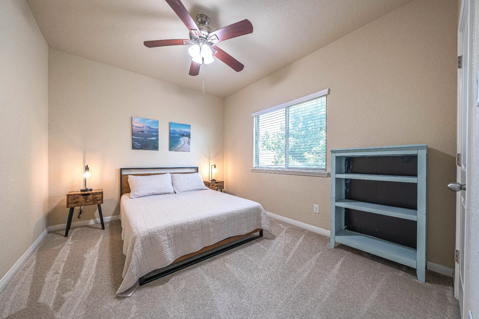 Furnished guest bedroom at the Upton Park home