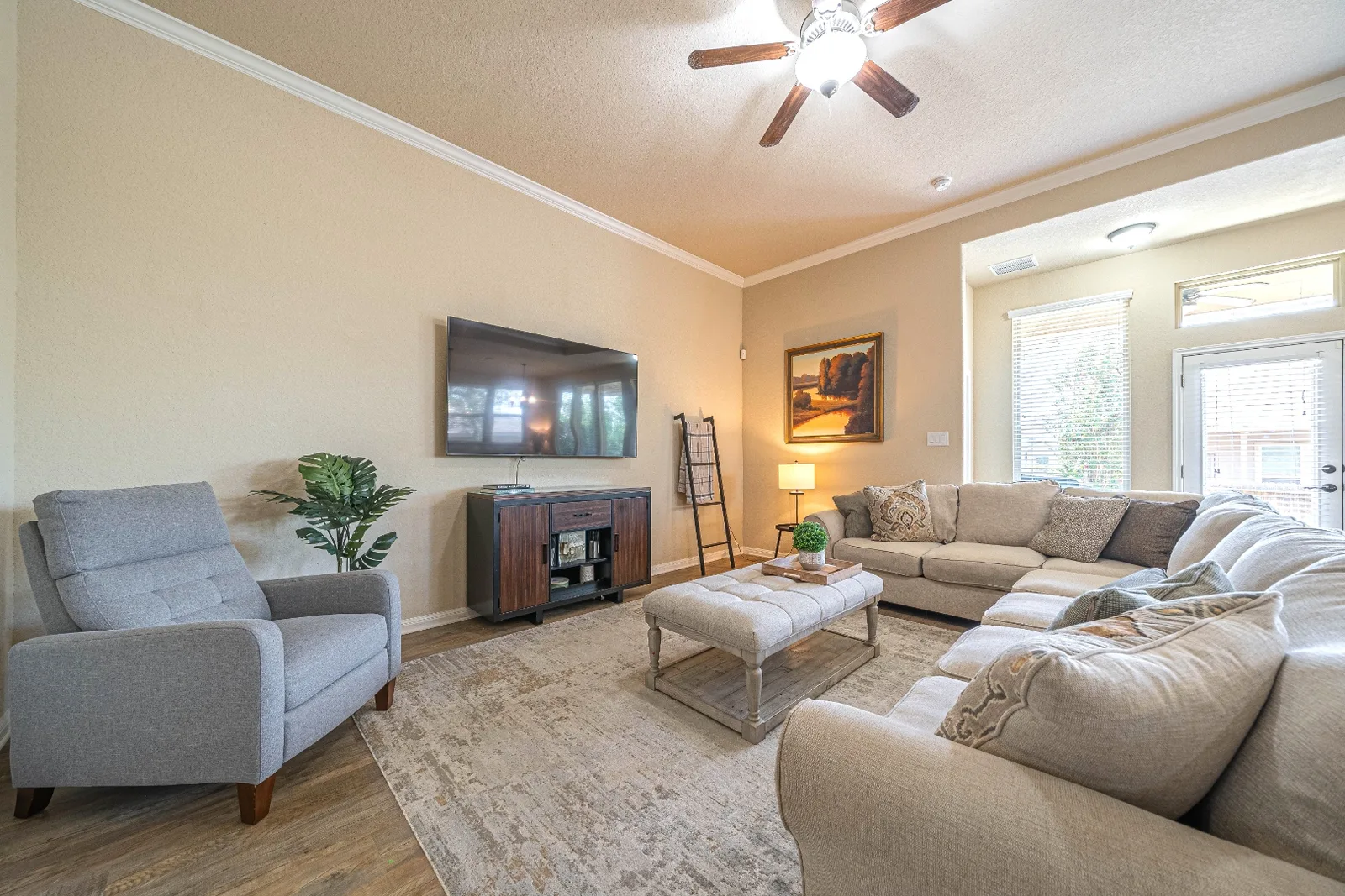 Comfortable furnished living room with fireplace at Upton Park