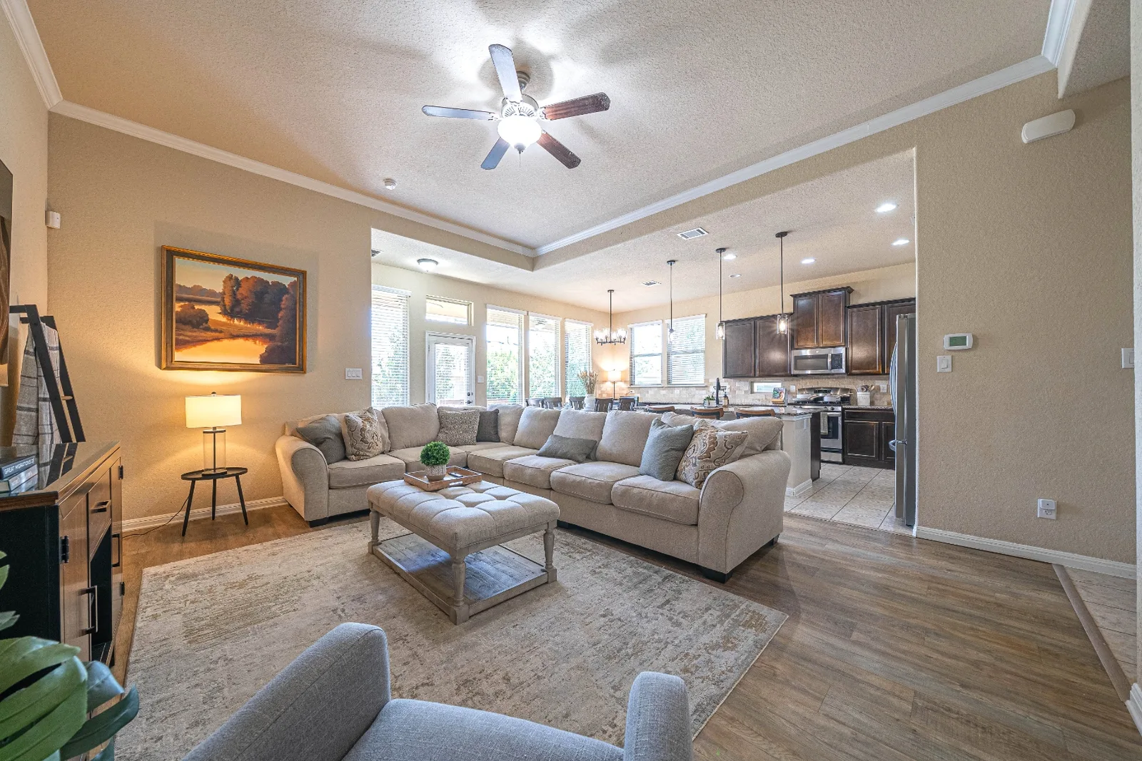 Spacious open living room and kitchen at the Upton Park furnished home
